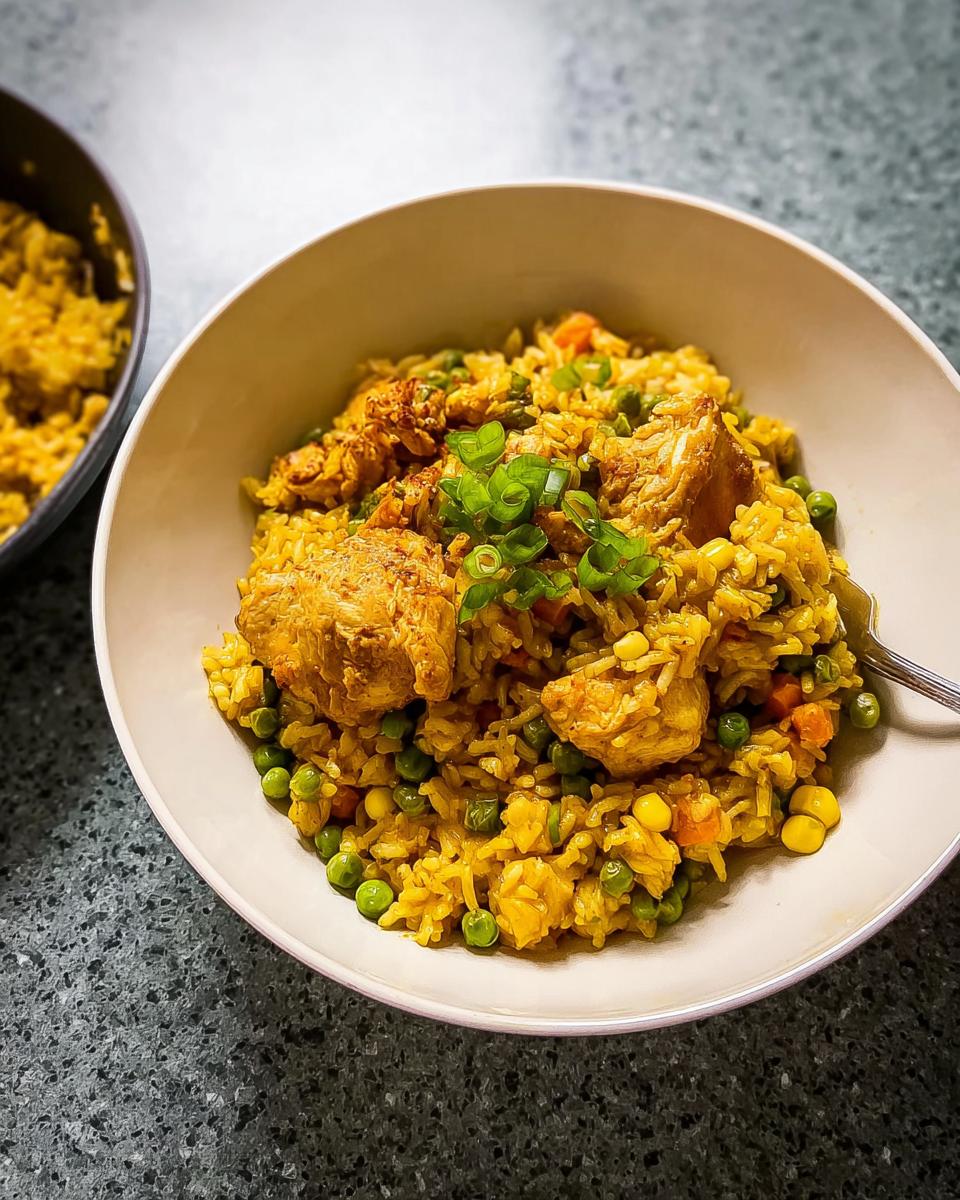 A close-up of a delicious chicken and vegetable rice bowl, part of our Rice Bowls Recipes in 12 Minutes.