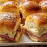 Close-up of delicious ham and cheese sliders, perfect for quick weeknight sandwich ideas.