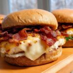 Close-up of a delicious restaurant-style chicken bacon burger, a perfect example of easy dinner recipes at home.